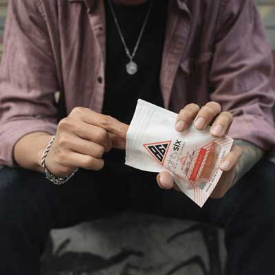  Person eating Delta-8 gummies