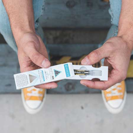 A Delta-8 Blue Dream vape cartridge