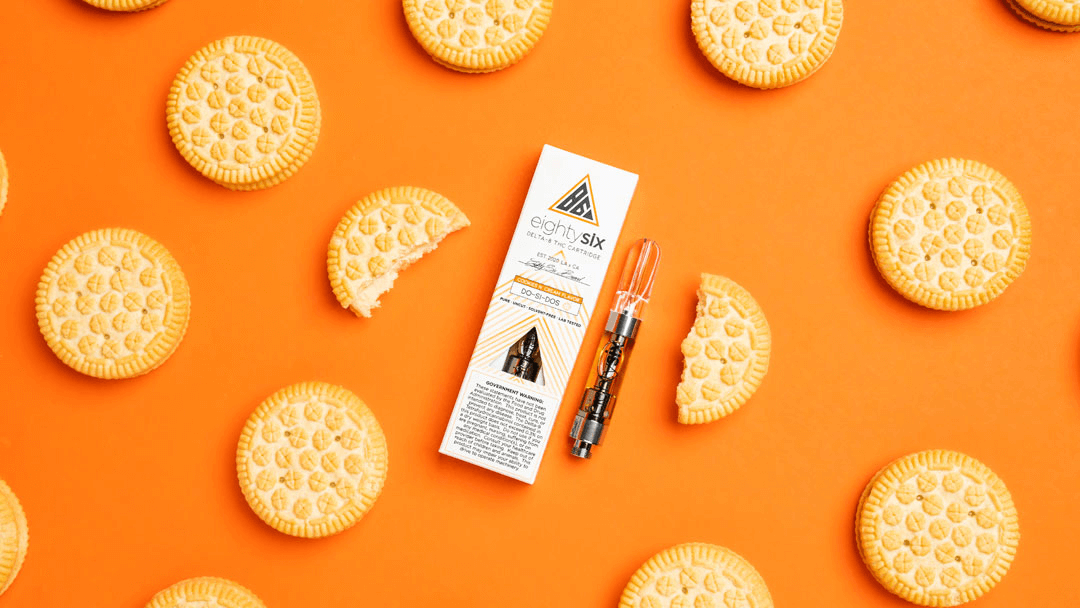 "bunch of biscuits with delta-8 thc vape cartridge in the floor "